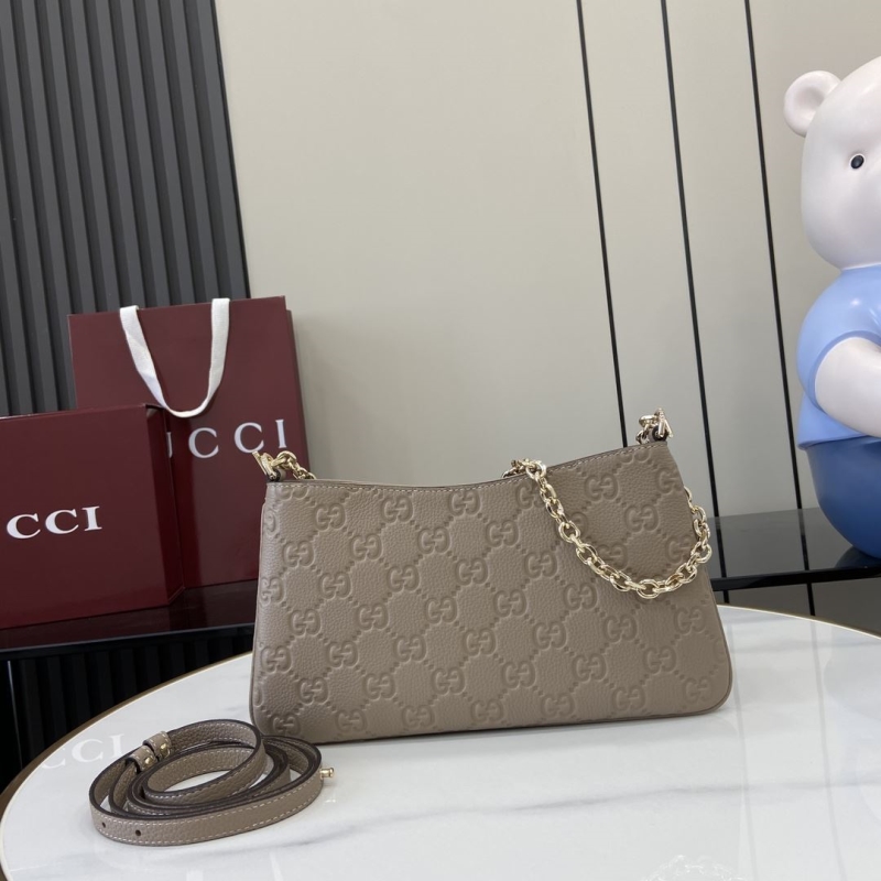 G*u*i satchel bags